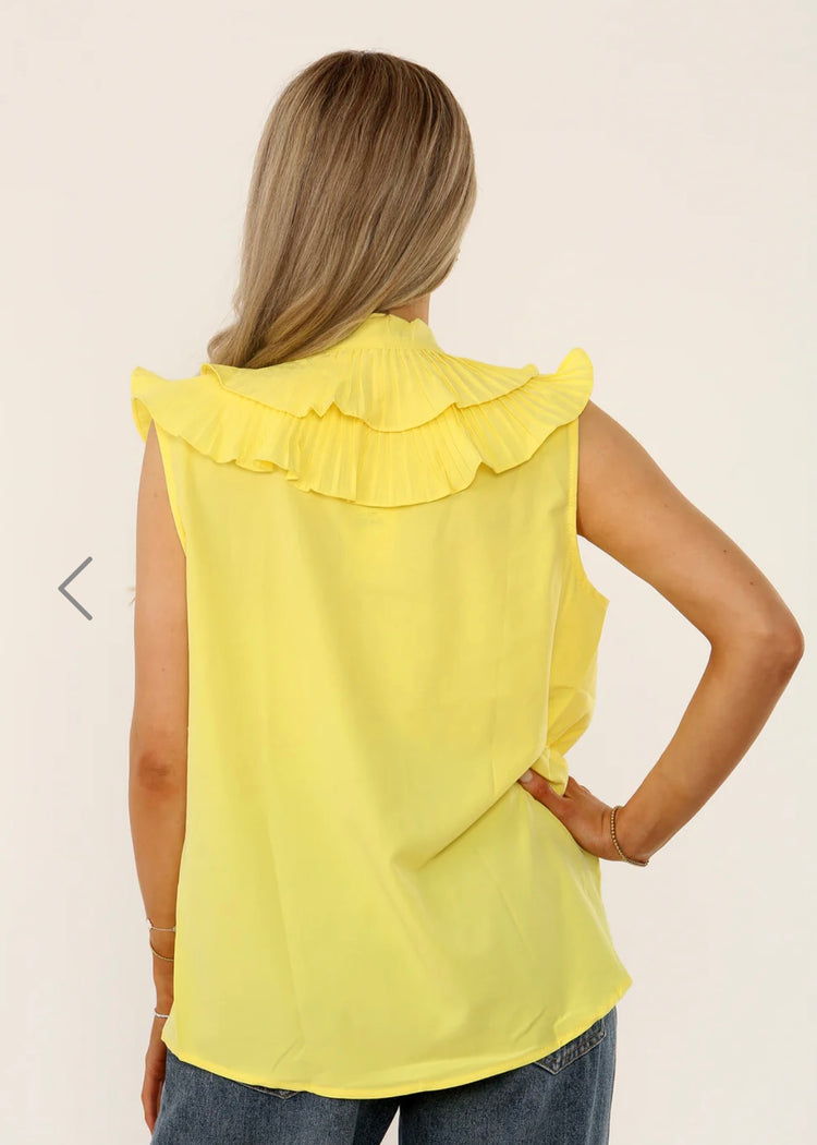 REMI | yellow ruffle detail sleeveless blouse