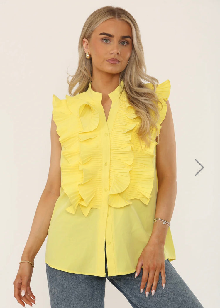 REMI | yellow ruffle detail sleeveless blouse