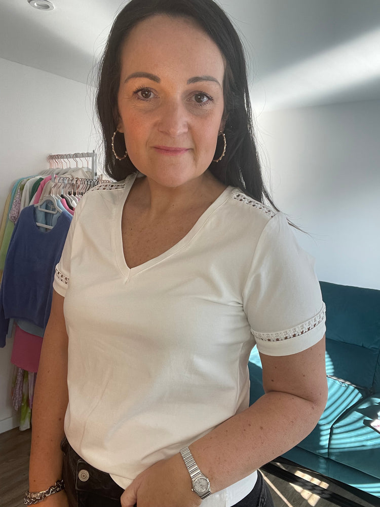 CORA| white v-neck top with cut out detail