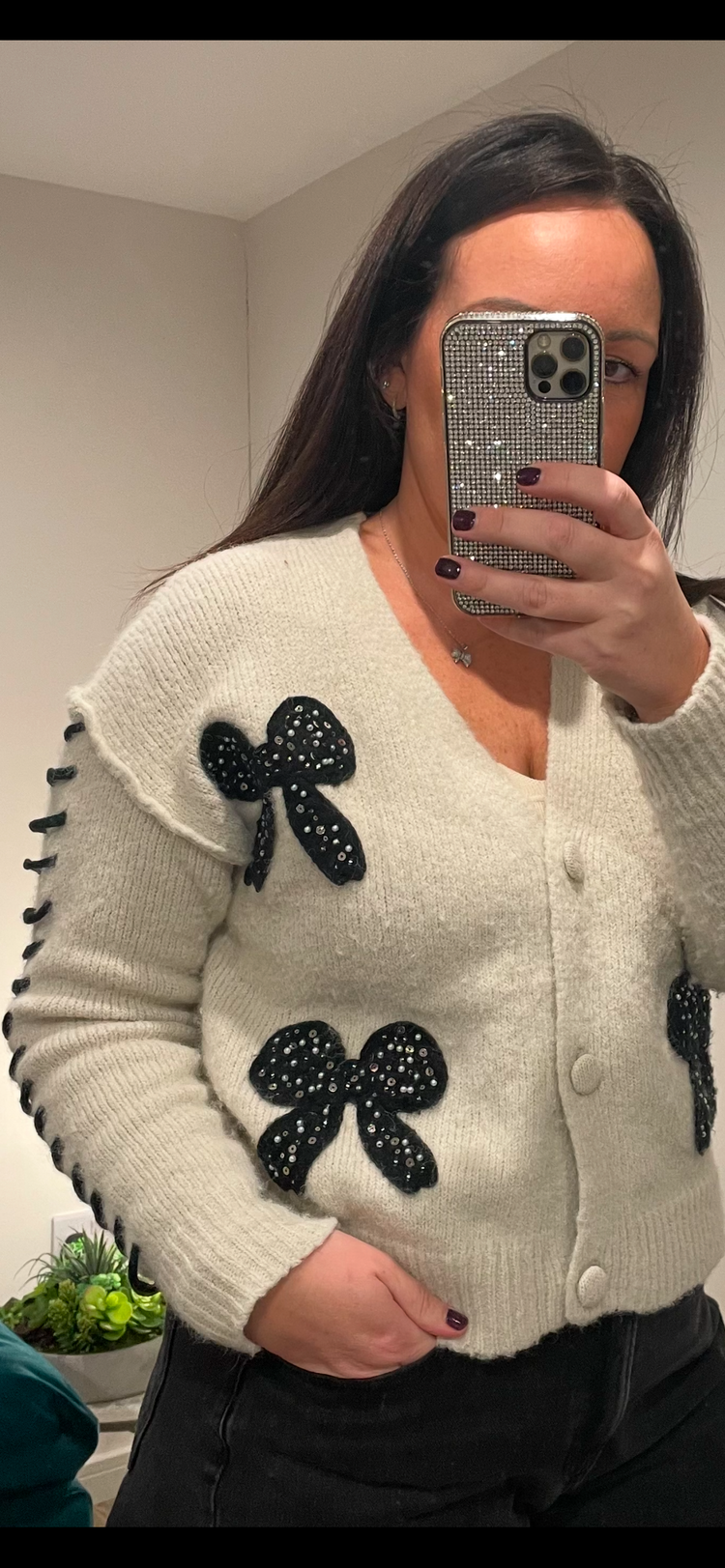 ALICIA | beige cardigan with black bow detail