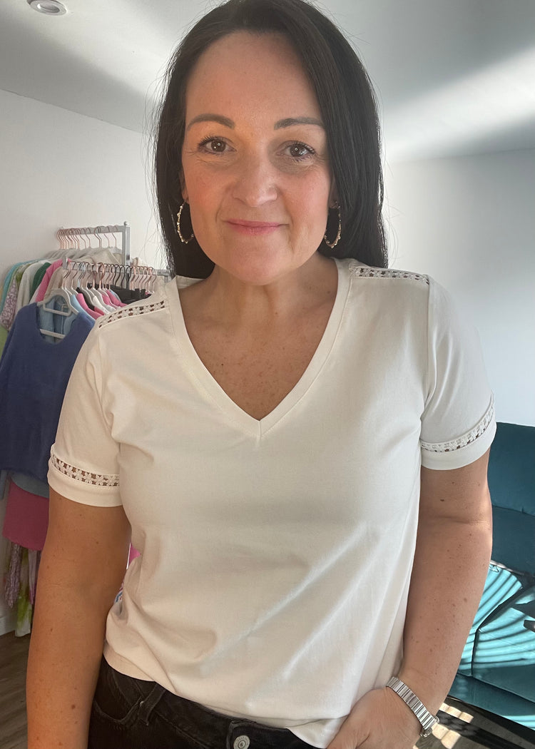 CORA| white v-neck top with cut out detail