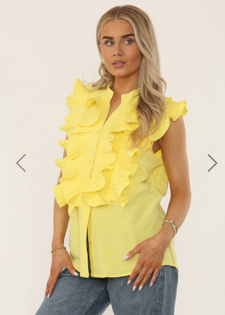 REMI | yellow ruffle detail sleeveless blouse