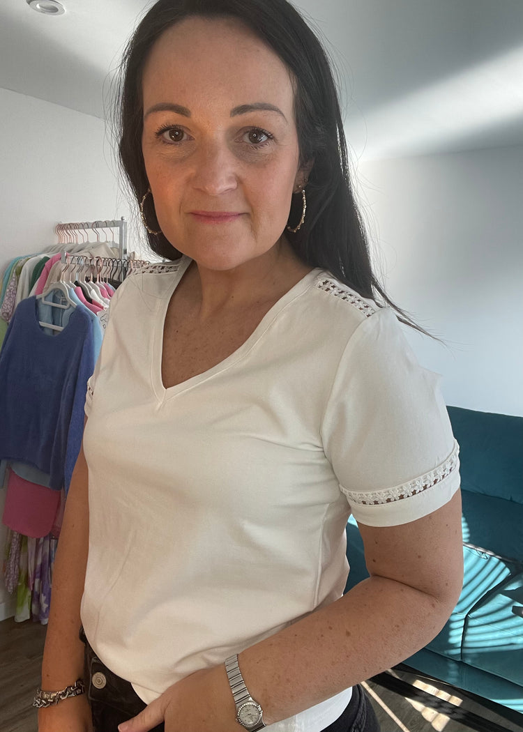 CORA| white v-neck top with cut out detail