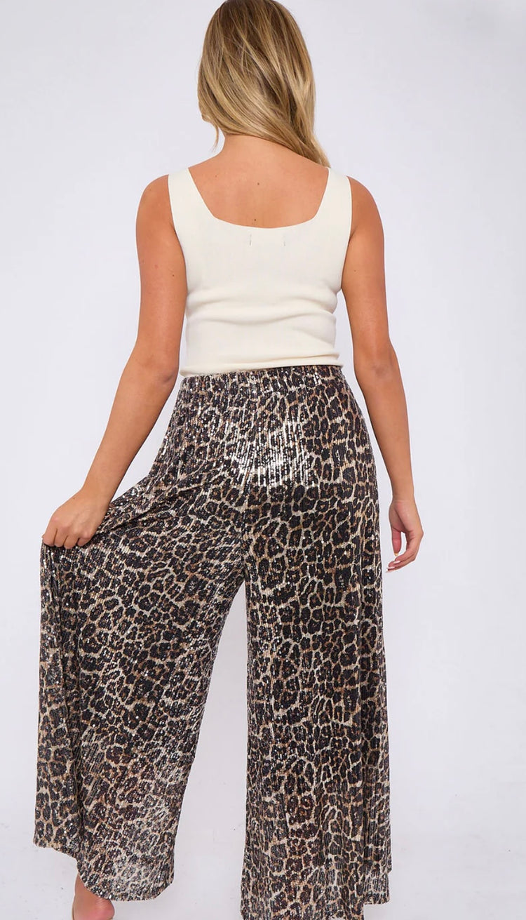 CLARA | sequin leopard print flare trousers