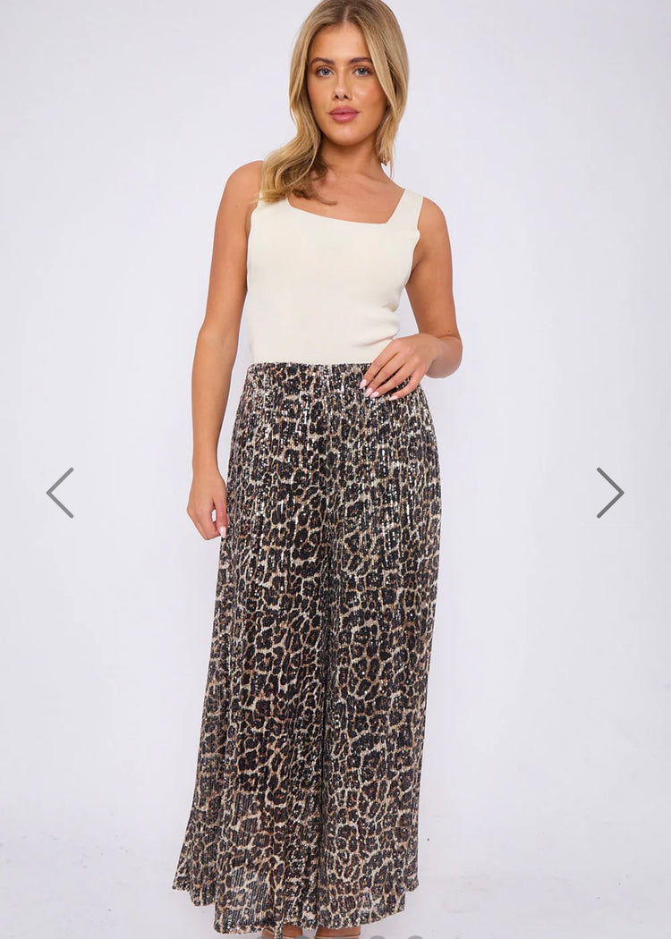 CLARA | sequin leopard print flare trousers