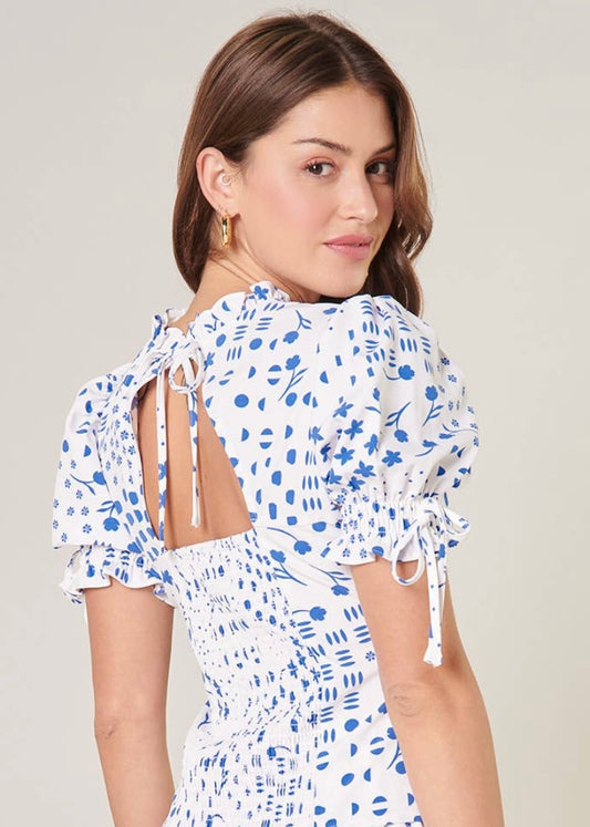 CLARA | blue and white print smocked back cut out top